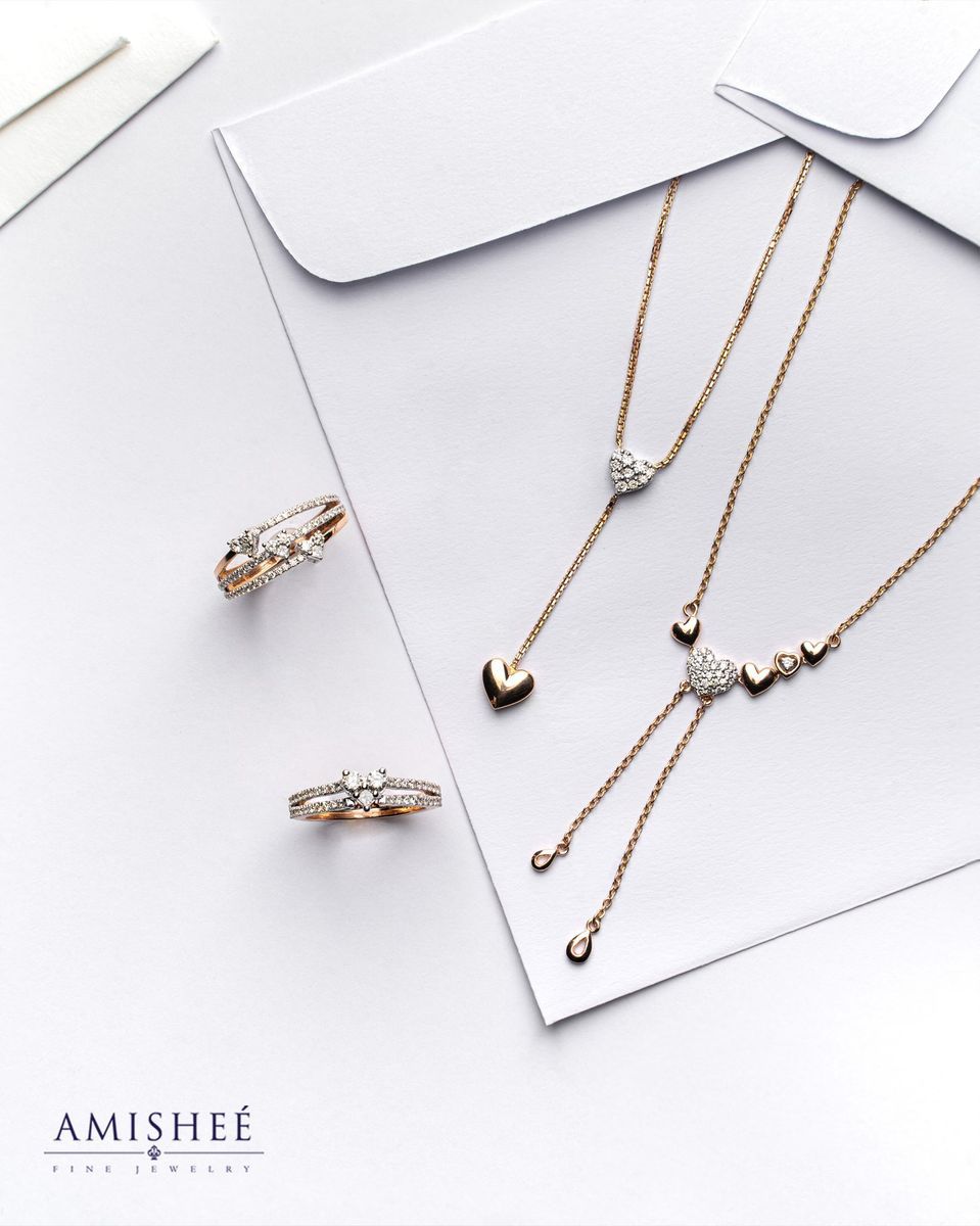 Image of Gold Necklaces and Rings with Diamonds